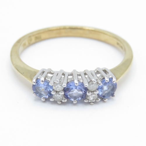 28 - 9ct Gold Diamond and Tanzanite Claw Set Ring (2g) Size N