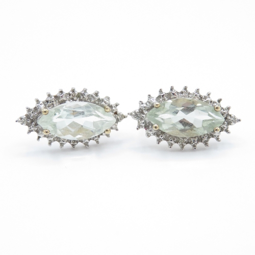 47 - 9ct White Gold Diamond and Aquamarine Earrings (2.6g)