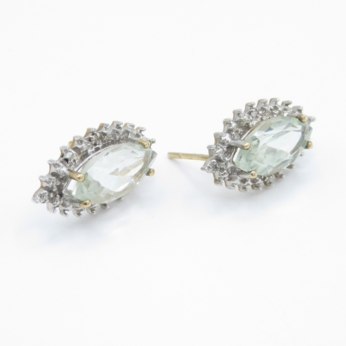 47 - 9ct White Gold Diamond and Aquamarine Earrings (2.6g)