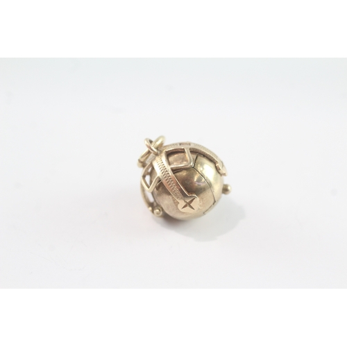 148 - 9ct gold & silver masonic ball charm (7.5g)