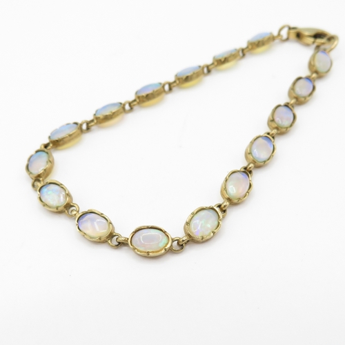 21 - 9ct gold opal cabochon bracelet (5g)
