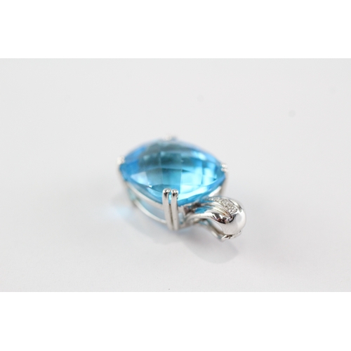 20 - 9ct white gold blue topaz pendant (5g)