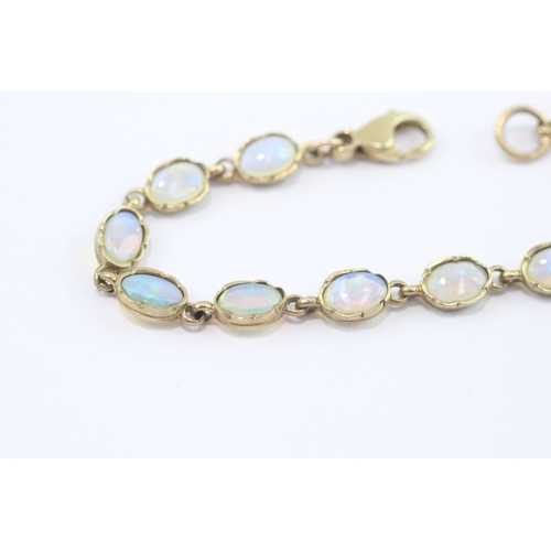 21 - 9ct gold opal cabochon bracelet (5g)