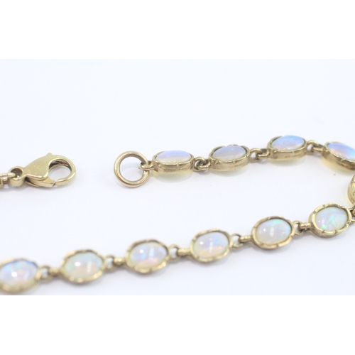 21 - 9ct gold opal cabochon bracelet (5g)