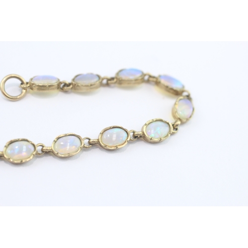 21 - 9ct gold opal cabochon bracelet (5g)