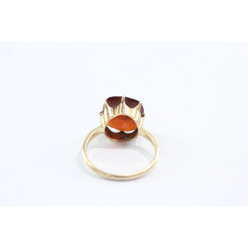 22 - 18ct gold garnet dress ring (AF chipping to stone) (4.7g) Size P