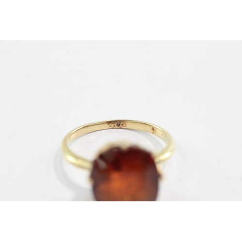 22 - 18ct gold garnet dress ring (AF chipping to stone) (4.7g) Size P