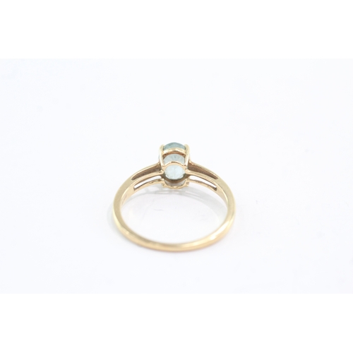 23 - 18ct gold aquamarine solitaire ring (2.5g) Size Q 1/2