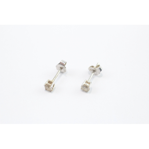 27 - 14ct white gold diamond studs earrings (0.7g)