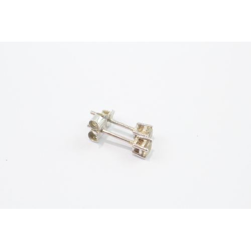 27 - 14ct white gold diamond studs earrings (0.7g)