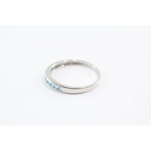 30 - 9ct gold blue topaz half eternity ring (2g) Size V