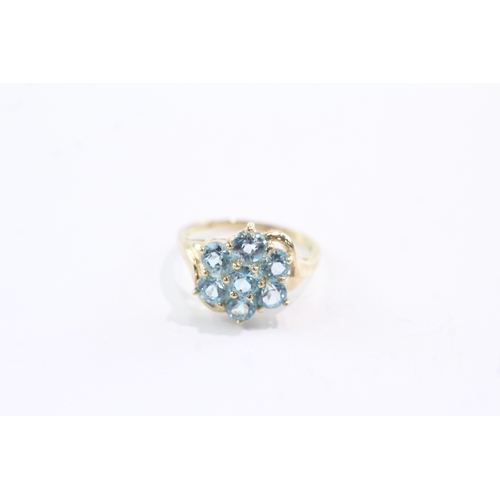 34 - 9ct gold topaz cluster ring (2.6g) Size M
