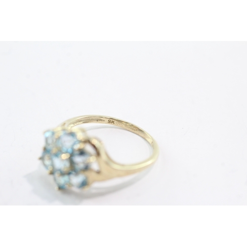 34 - 9ct gold topaz cluster ring (2.6g) Size M