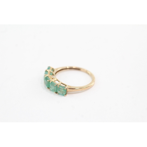 44 - 9ct gold emerald five stone ring with diamond on the side (1.9g) Size N