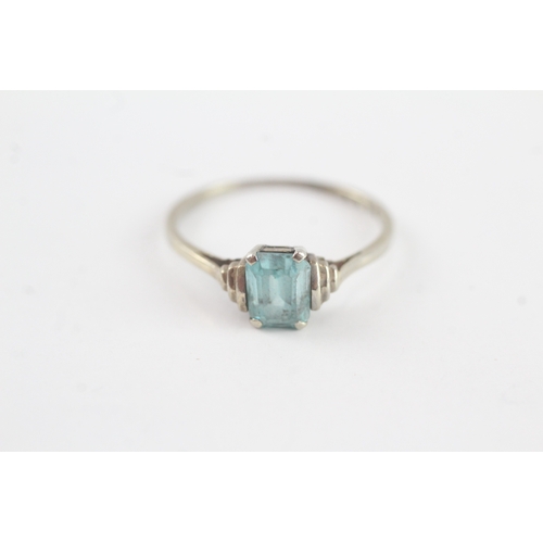 53 - 9ct gold blue zircon solitaire ring (1.7g) Size P