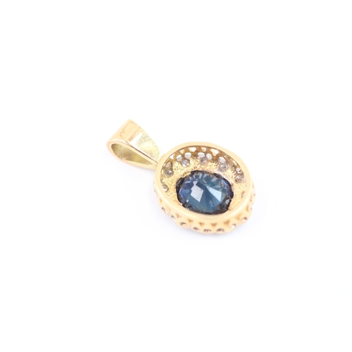 55 - 18ct gold sapphire diamond halo cluster pendant (2.2g)