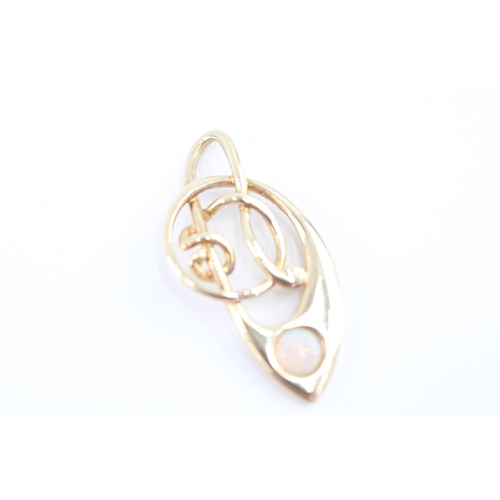 58 - 9ct gold opal music note pendant (1.5g)