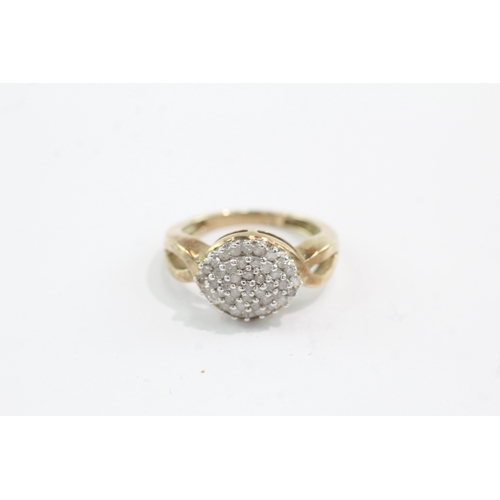 59 - 9ct gold diamond cluster ring (4.1g) Size P