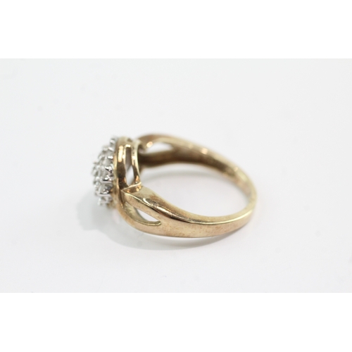 59 - 9ct gold diamond cluster ring (4.1g) Size P