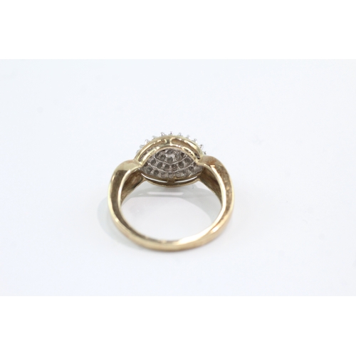 59 - 9ct gold diamond cluster ring (4.1g) Size P