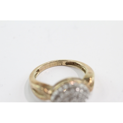 59 - 9ct gold diamond cluster ring (4.1g) Size P