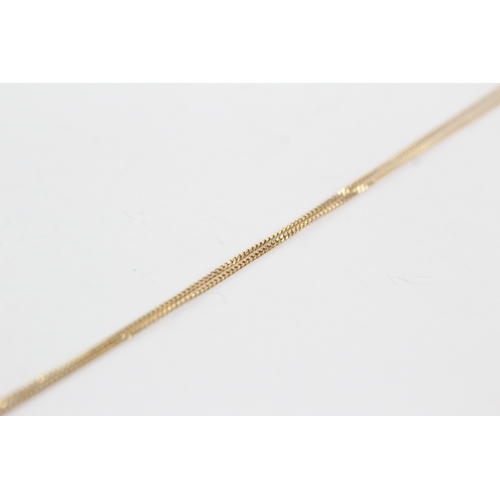 60 - 9ct gold diamond starburst pendant necklace (1.4g)