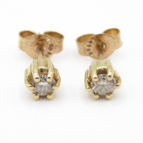 38 - 9ct gold diamond studs (1g)