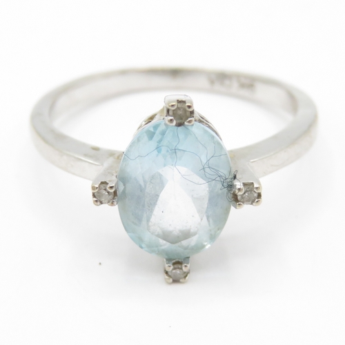 55 - 9ct gold topaz diamond ring (2.7g) Size O