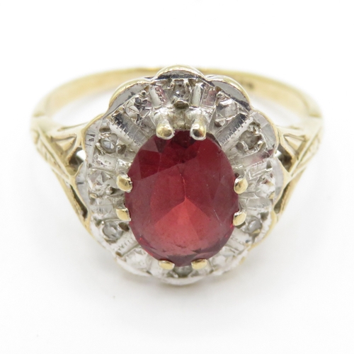 59 - 9ct gold garnet diamond cluster ring (2.5g) Size J