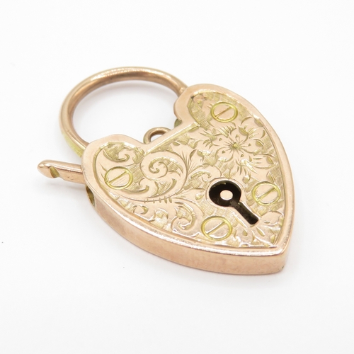8 - 9ct gold foliage patterned padlock (3.8g)