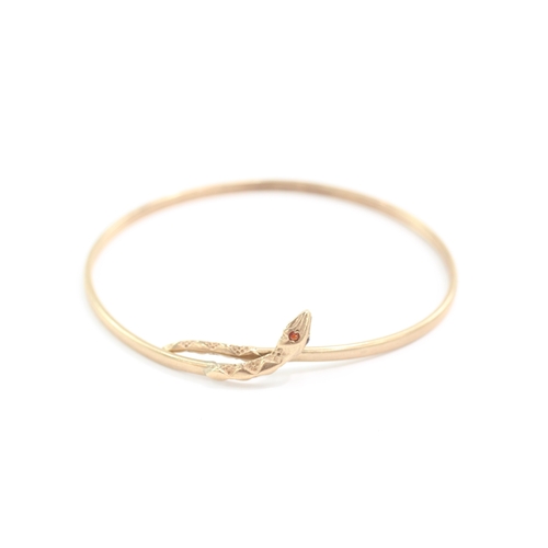 11 - 9ct gold ruby eyes snake bangle (5g)