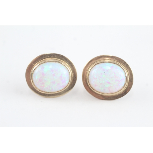 15 - 9ct gold synthetic opal stud earrings (3.8g)