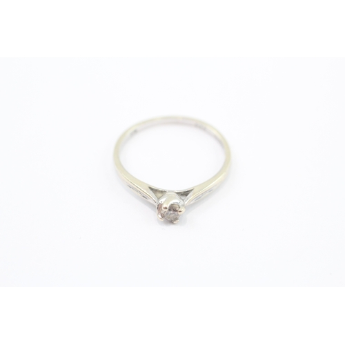 23 - 9ct white gold diamond solitaire ring (1.1g) Size L