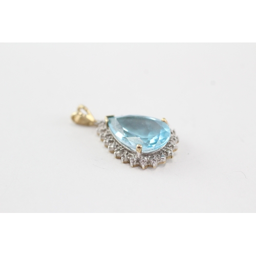 25 - 9ct gold blue topaz pear cut diamond halo cluster pendant (2.4g)