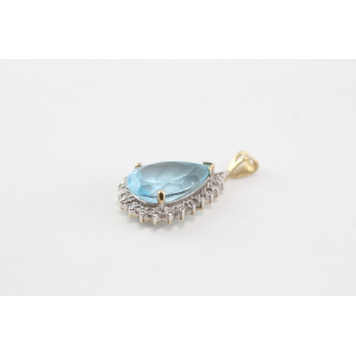 25 - 9ct gold blue topaz pear cut diamond halo cluster pendant (2.4g)