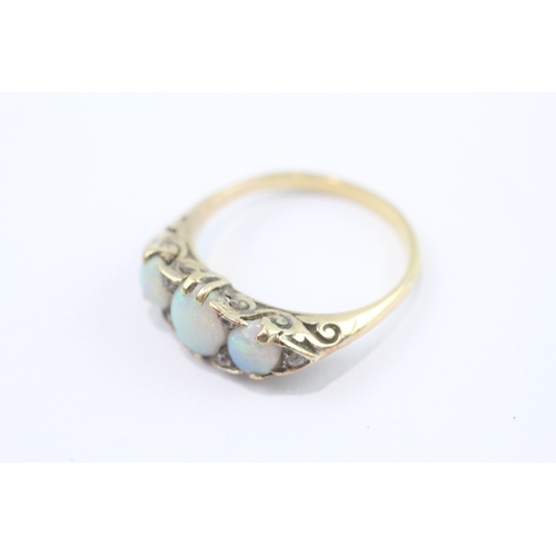 26 - 18ct gold opal diamond boat ring (3.9g) Size R