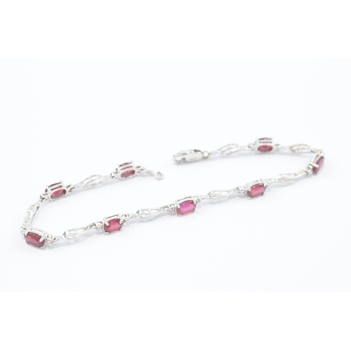 32 - 14ct white gold ruby diamond link bracelet (5.8g)
