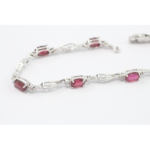 32 - 14ct white gold ruby diamond link bracelet (5.8g)