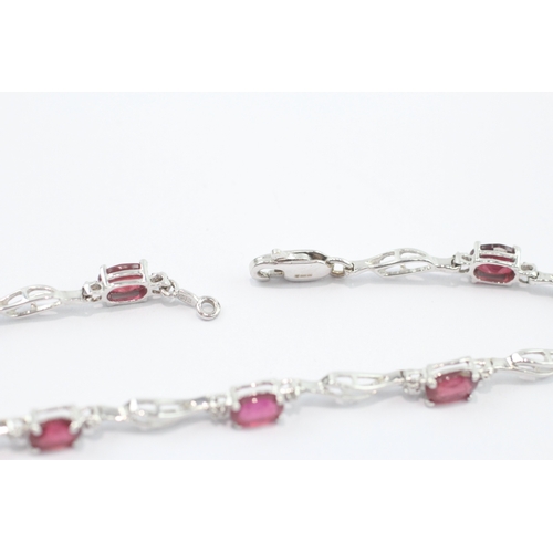 32 - 14ct white gold ruby diamond link bracelet (5.8g)