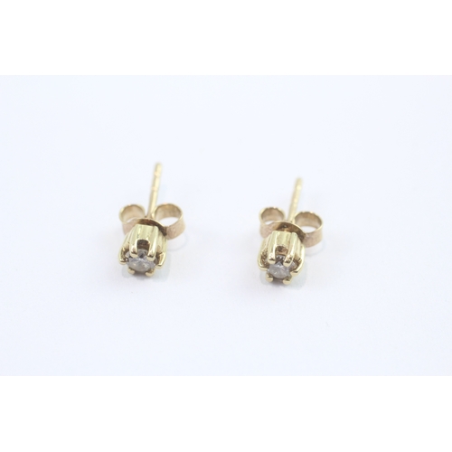 38 - 9ct gold diamond studs (1g)