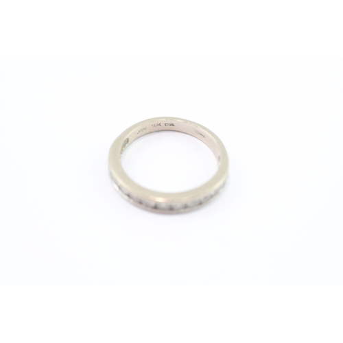 39 - 18ct white gold diamond half eternity channel set ring (2.7g) Size J