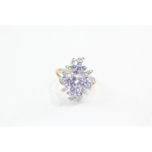42 - 9ct gold diamond tanzanite floral ring (3.4g) Size S