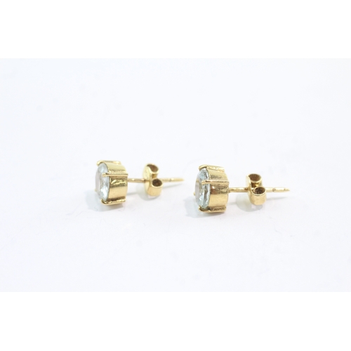 45 - 18ct gold aquamarine stud earrings (2.3g)