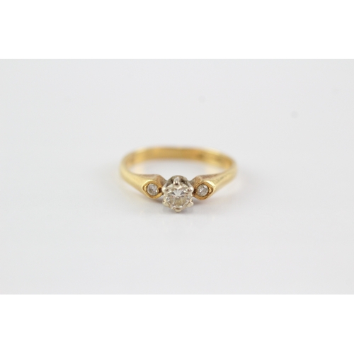 49 - 18ct gold diamond three stone ring (2.4g) Size J 1/2
