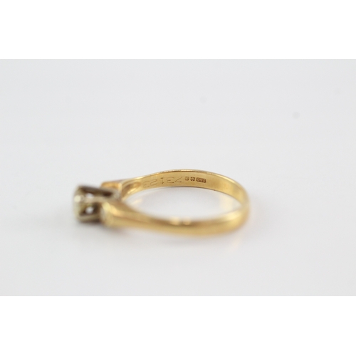 49 - 18ct gold diamond three stone ring (2.4g) Size J 1/2