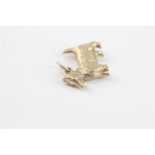 50 - 9ct gold dog charm (1.1g)