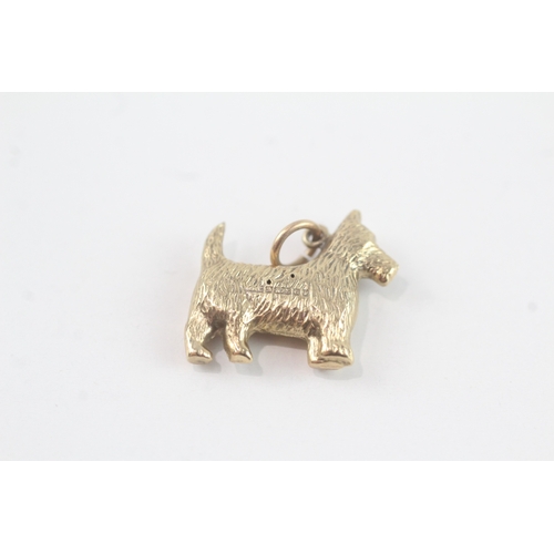 50 - 9ct gold dog charm (1.1g)