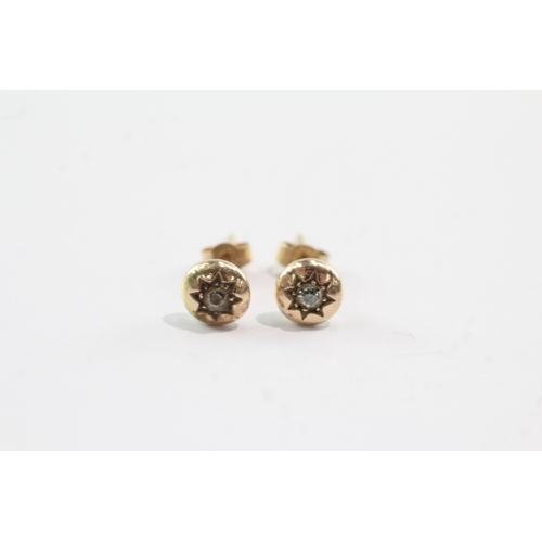 54 - 9ct gold diamond gypsy studs (1.6g)