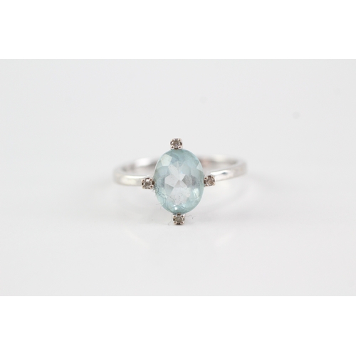 55 - 9ct gold topaz diamond ring (2.7g) Size O