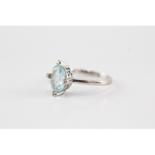 55 - 9ct gold topaz diamond ring (2.7g) Size O